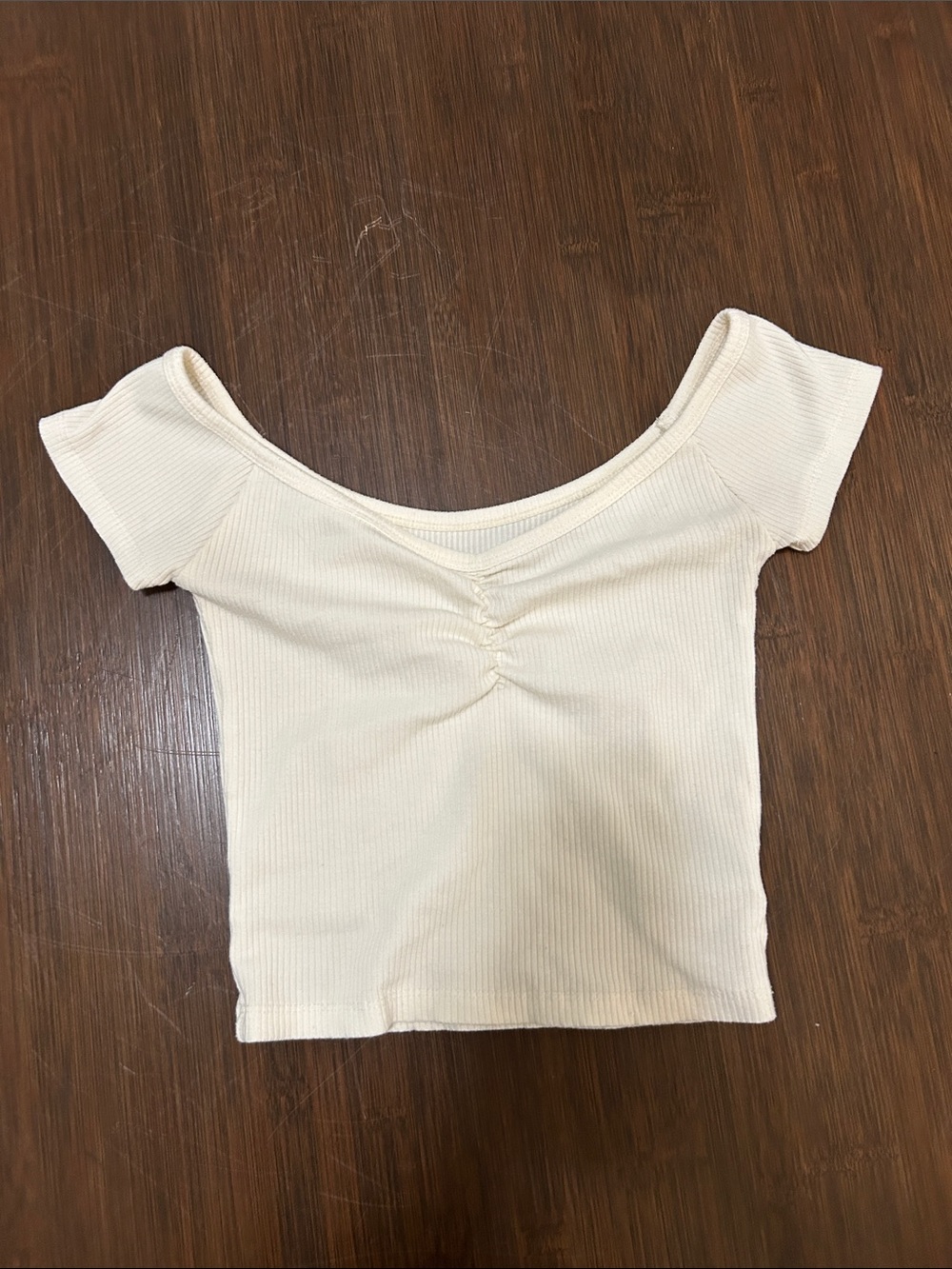 American Eagle Outfitters Ribbed Off-Shoulder Crop Top in Cream